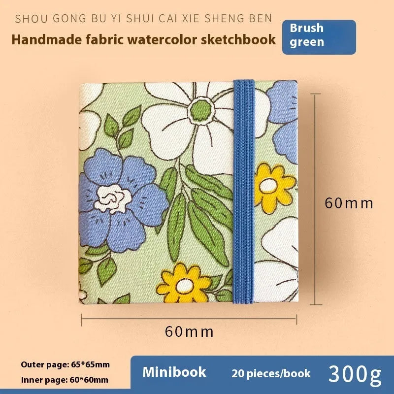 Feiluniao handmade fabric watercolour notebook with cotton paper, 185mm long, shown in a cover design option.