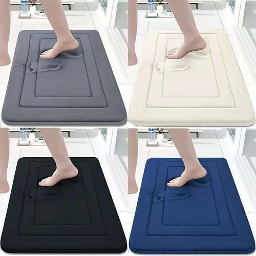 Soft coral velvet bathroom mat with thickened memory foam and anti-slip backing on tiled floor