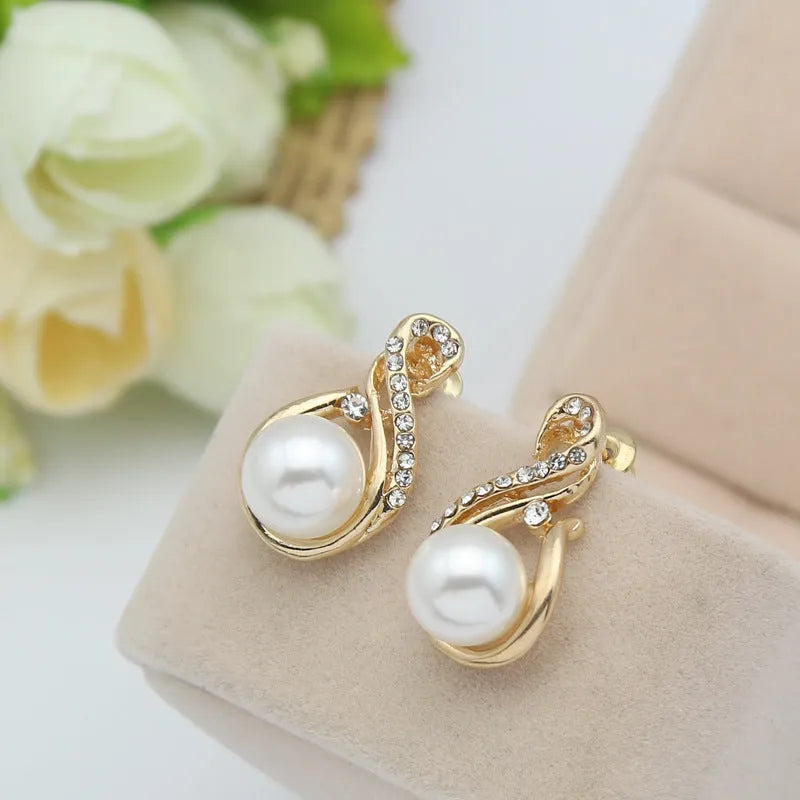 Pearl necklace and earring set on display, alloy with plastic beads, 45cm length, for evening or bridal use