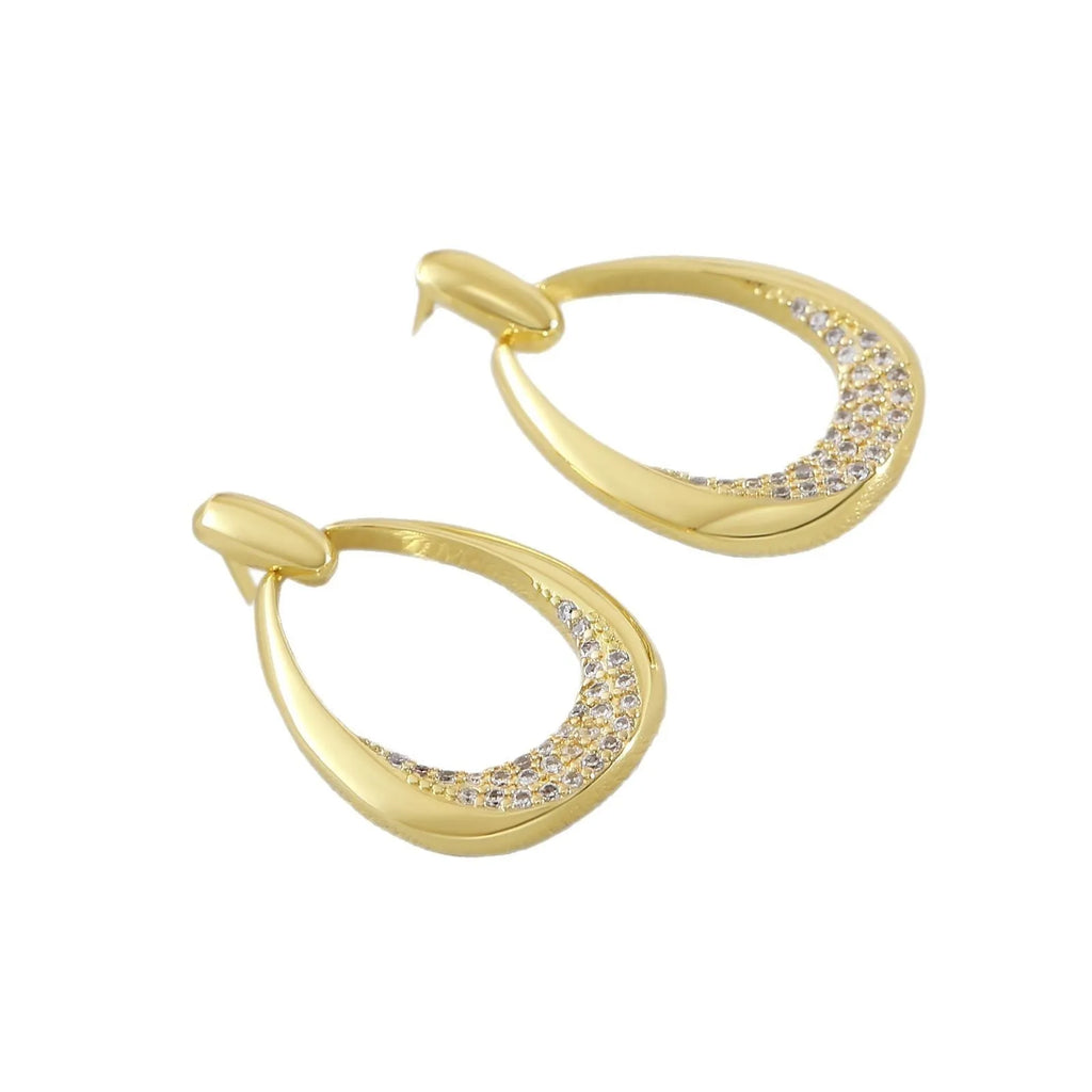 Yellow gold geometric drop earrings for women on a plain background, showing their 2.6 cm length.