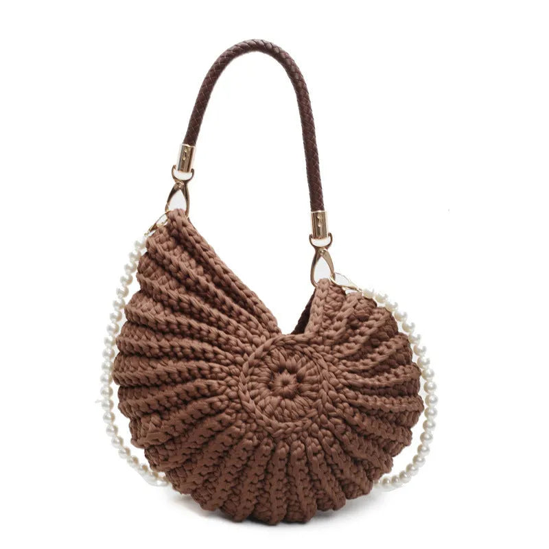 Handmade woven cloth bag in retro style with open pocket and double shoulder straps.