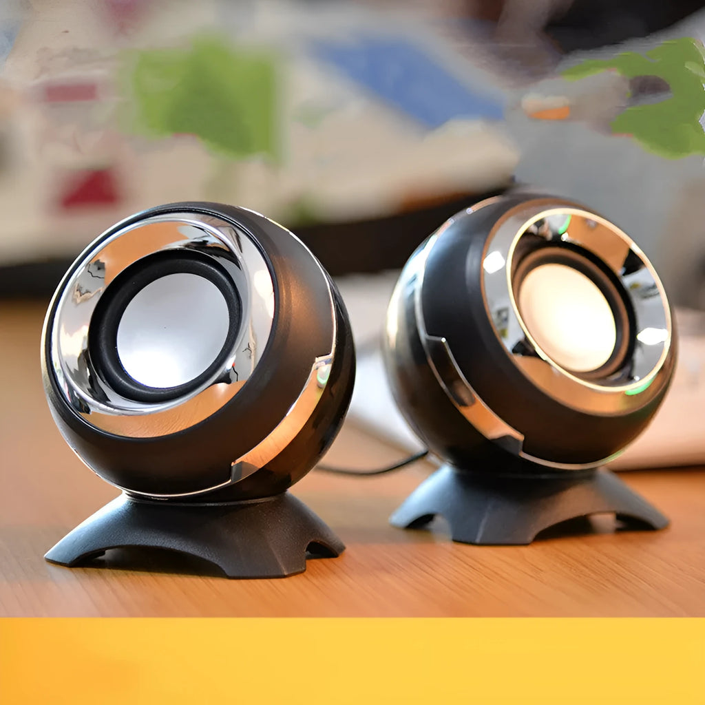 Compact black and gold USB-powered stereo desktop speakers for laptop and computer.
