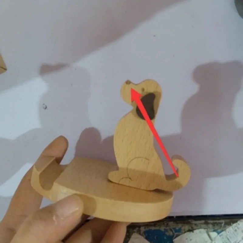 Handcrafted beech wood and resin lazy bracket mobile phone holder on a wooden desk