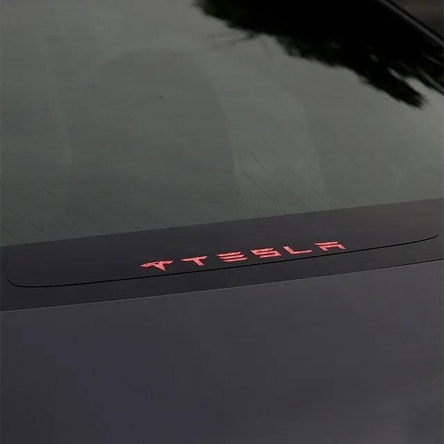 Acrylic brake light decoration sticker applied on a Tesla Model3 tail light