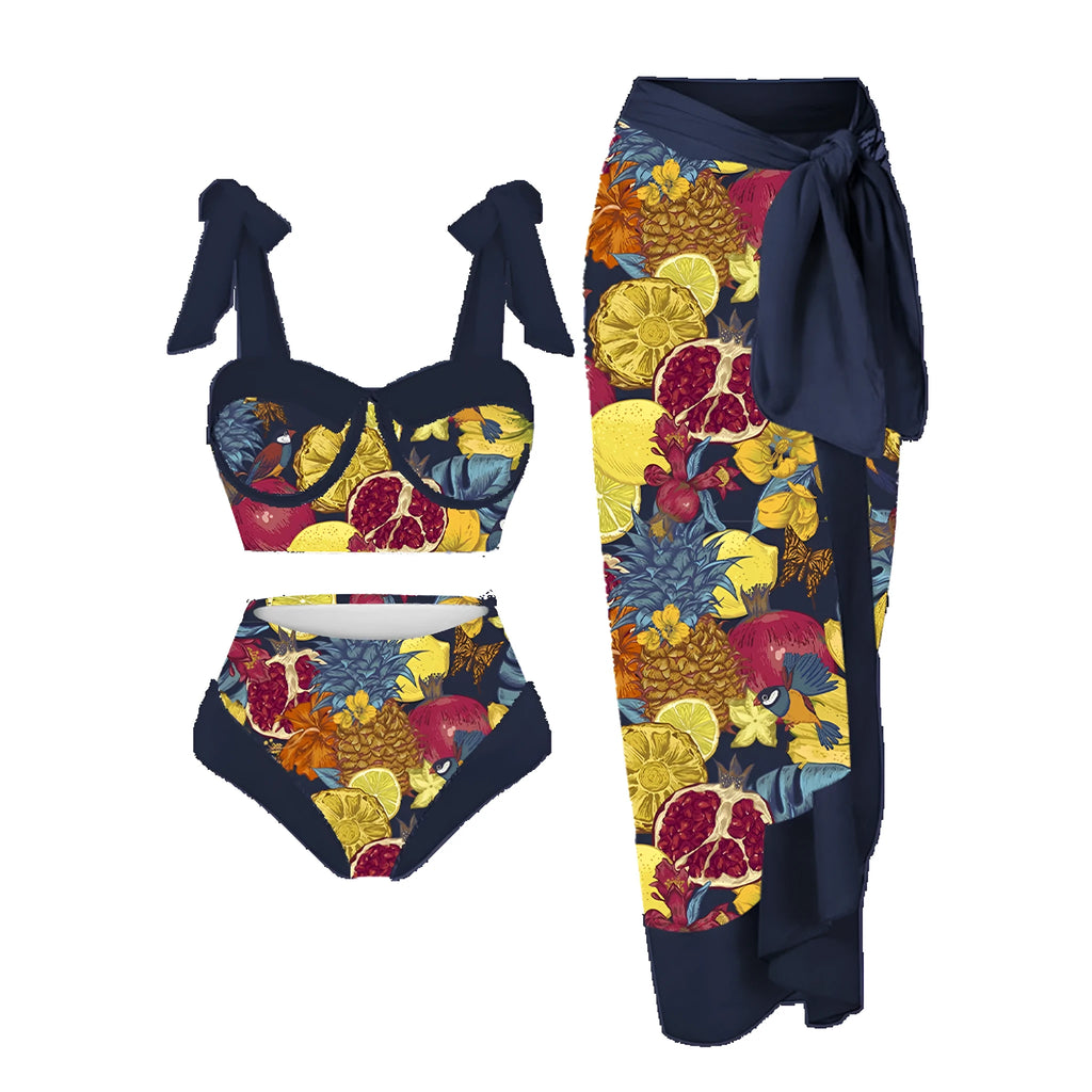 Women's pink floral print three-piece swimsuit set with skirt on a mannequin.