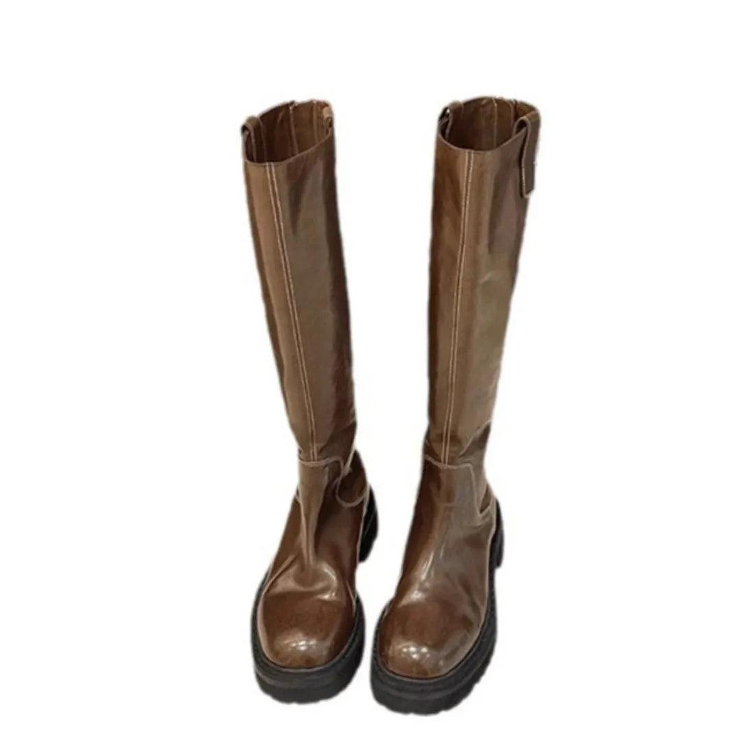 Black chunky heel knight boots with round toe and high shaft, showing the back zip detail.