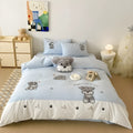 Schnauzer cartoon embroidered bedding set with quilt cover, sheet and pillowcases on bed