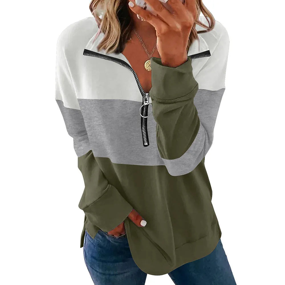 Women's loose long-sleeved leopard print sweater in polyester on a hanger