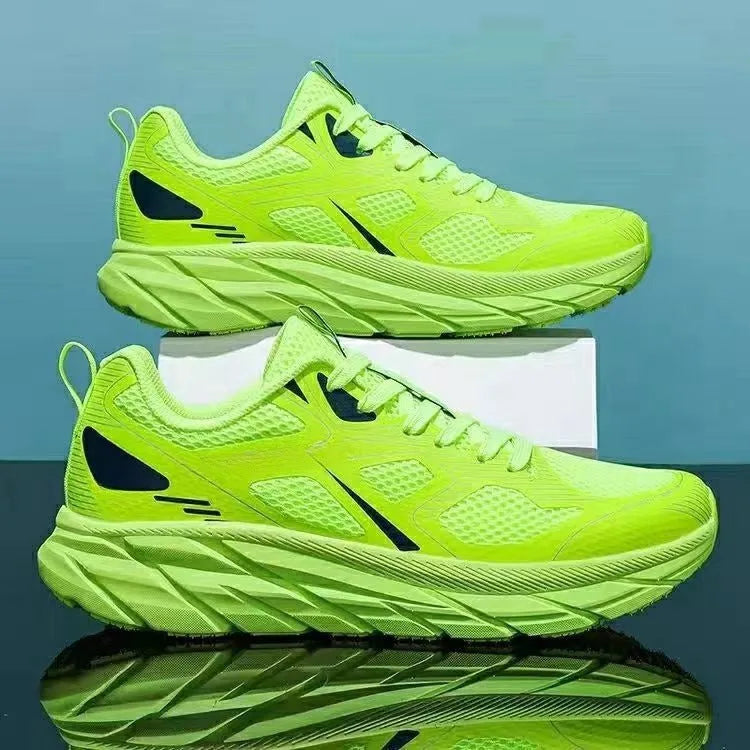 Red, beige, green, gray, and black mesh casual sneakers with round toe and plastic sole.