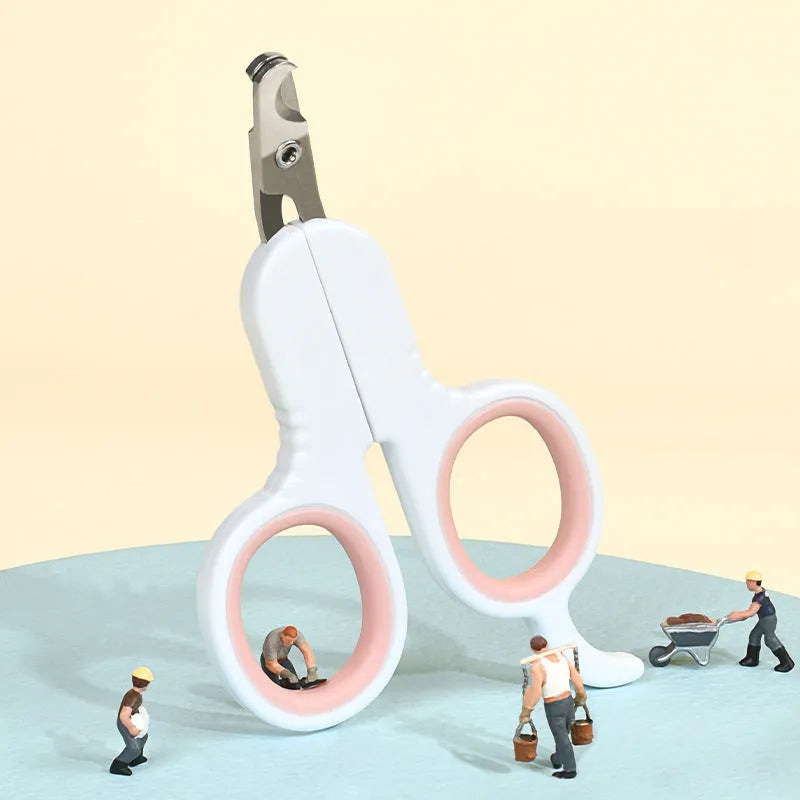 Grey and pink pet nail clippers with curved tips and a rubber-coated anti-slip handle on a white background.