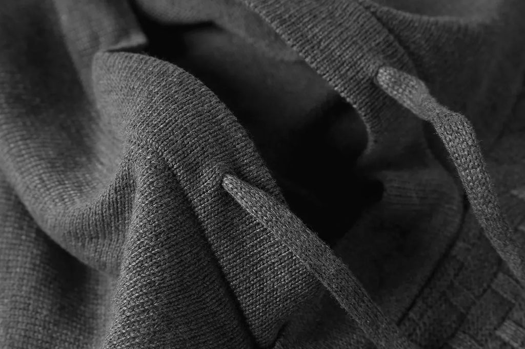 A men's hoodie sweater in a cotton and polyester blend, shown in one of nine available colours.