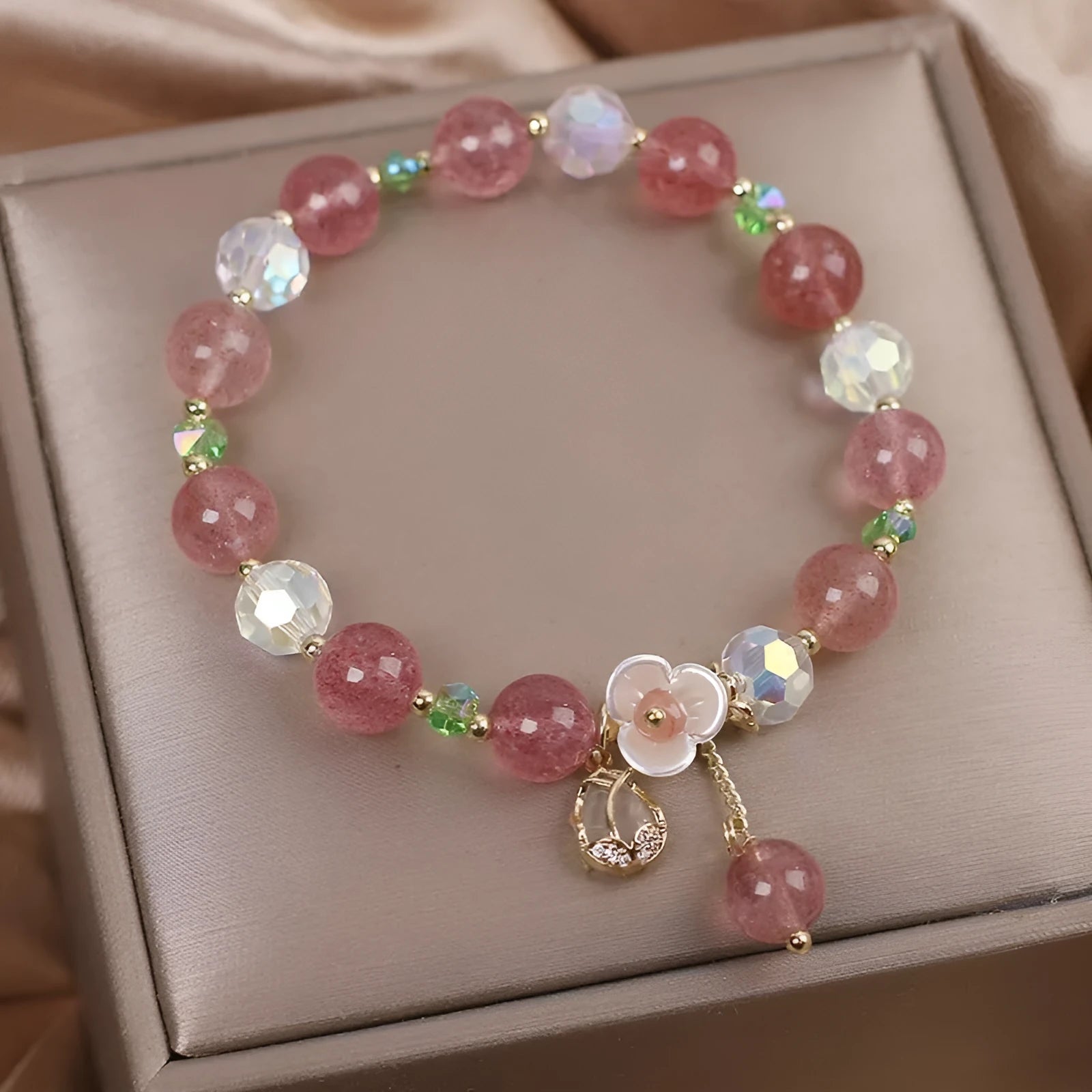 Women's double layer crystal bracelet with lucky cat charm and red cat's eye flowers in ethnic fairy style.