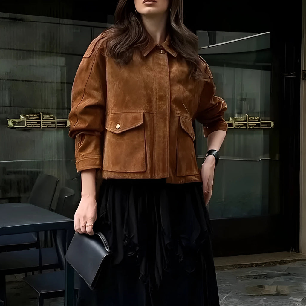 Women's brown suede-look polyester coat with regular sleeves on a hanger.