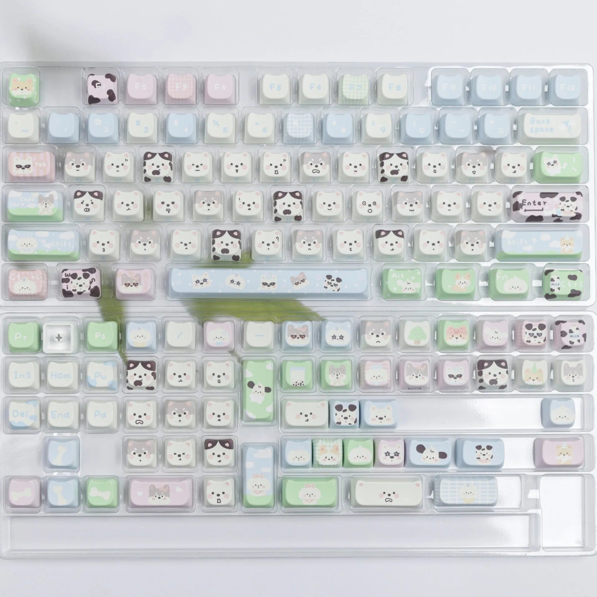 Full set of colourful anime puppy design PBT keycaps for a mechanical keyboard on a white background.