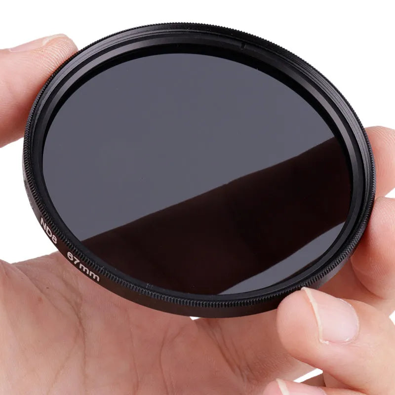 Redcircle ND8 neutral density camera filter with silver aviation aluminium frame on a camera lens.