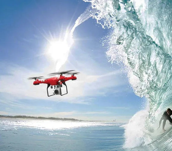 X52 RC quadcopter drone with 1080P camera, black fuselage, and four rotor arms on a white background