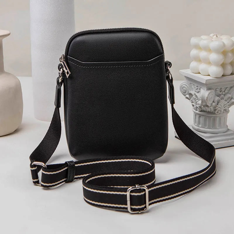 Solid colour PU leather crossbody phone bag in beige, shown with adjustable strap.