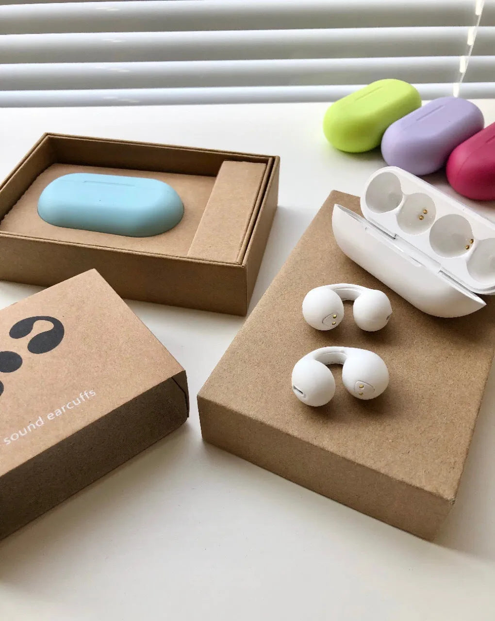 Bone conduction ear clip headset in macaron colours with Qualcomm chip and 20 metre range