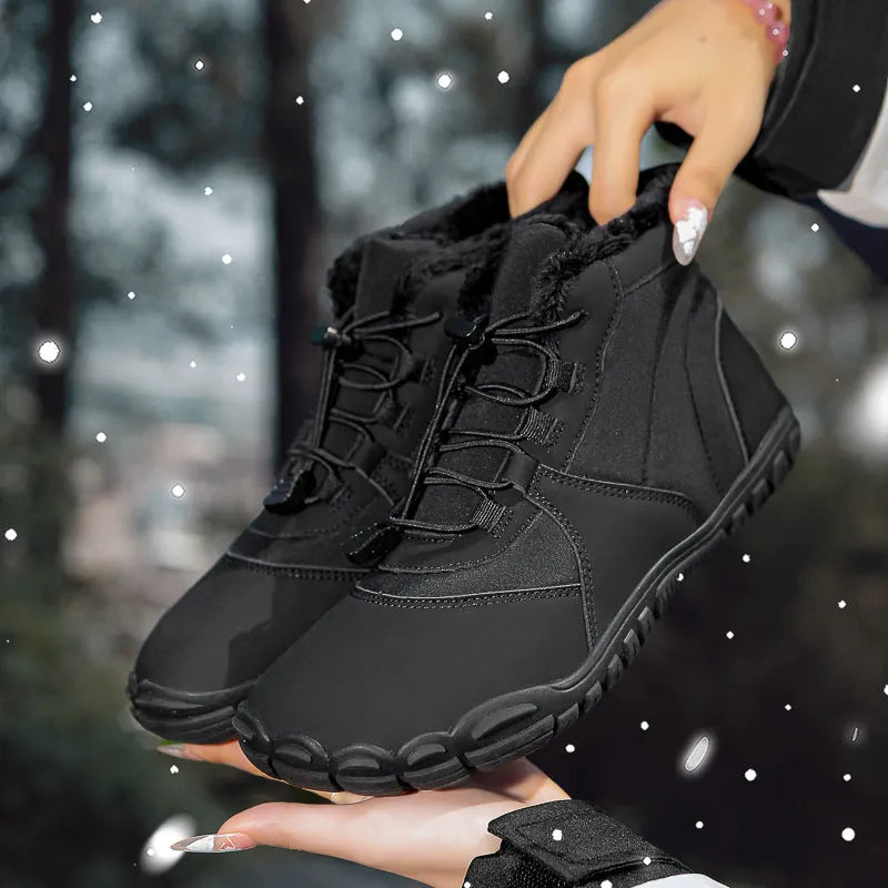 Black unisex waterproof winter snow boots with fleece lining and rubber sole on a wet surface.