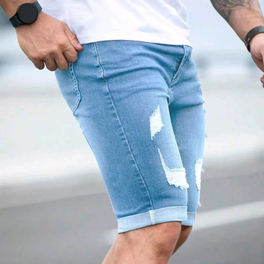 Men's sky blue straight-leg denim shorts with low waist and zipper fly.