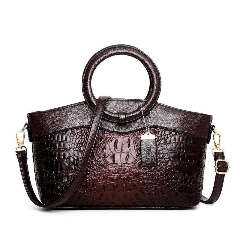 A casual fabric shoulder bag for women in multiple colours, showing zipper pockets and a handle.