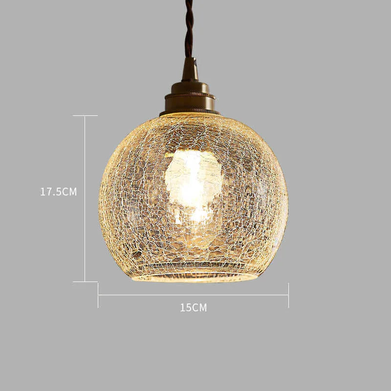 Brass and glass ball chandelier with spherical design measuring 17.5cm diameter