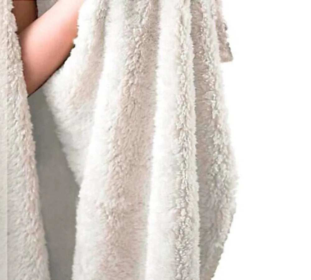 Round coral coloured flannel burrito blanket with a delicious print, shown folded.