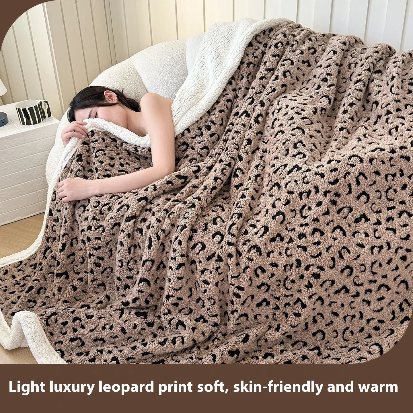 Double-layer cationic leopard jacquard taffeta blanket showing reversible design with zebra pattern
