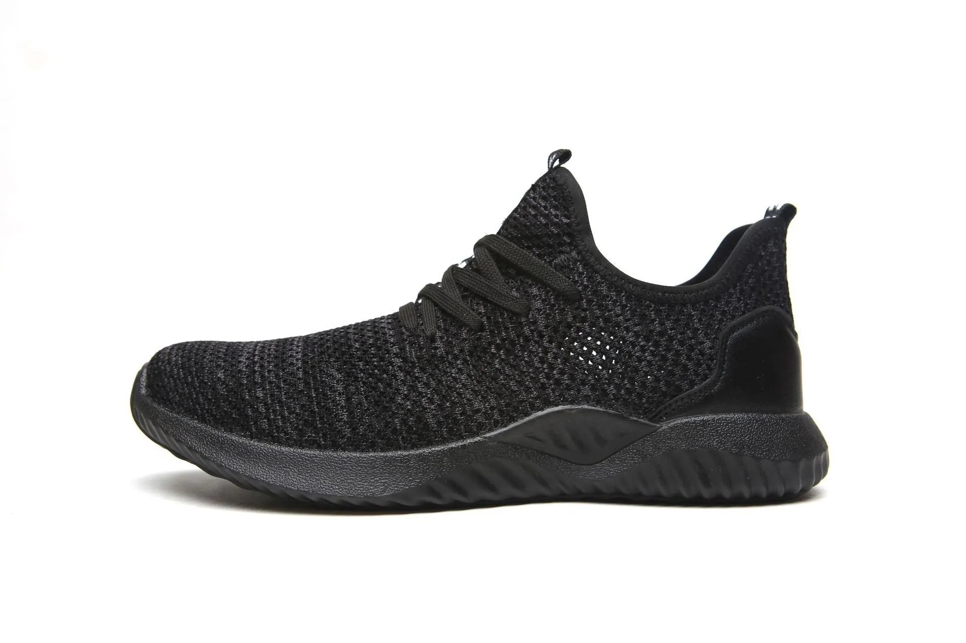 Low-cut black safety work shoes with a steel toe cap on a grey background.