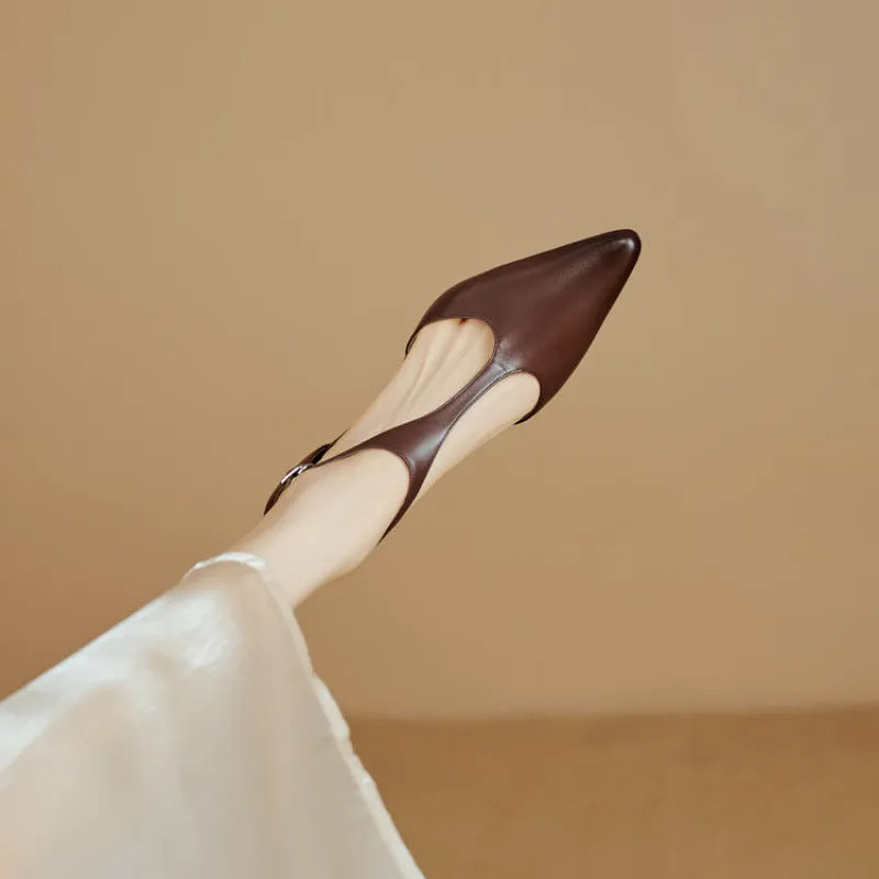 Brown and black women's pointed toe high heels made from cowhide leather.