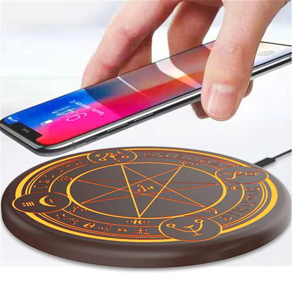 Magic Array 10W wireless charger, 99mm diameter and 8mm thick circular pad, in Blue or Orange.