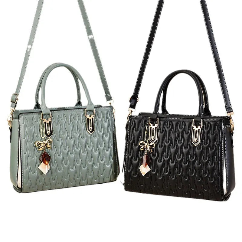 Women's large simple shoulder messenger bag in polyester available in five colours.