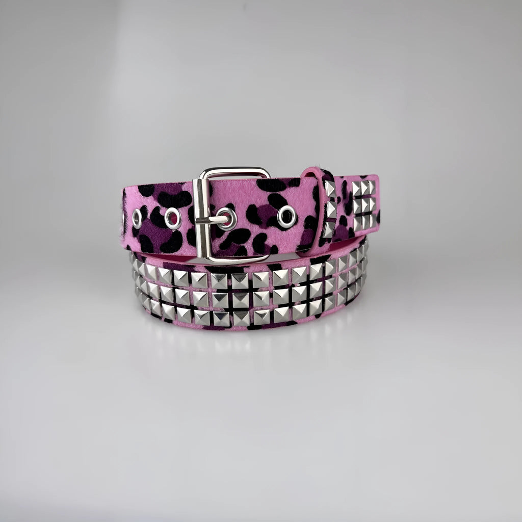 Women's punk style belt with decorative metal rivets on PU leather in animal print pattern with alloy buckle