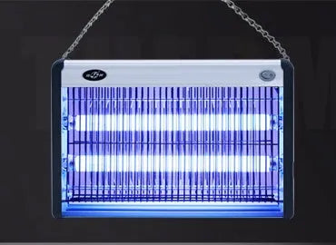 Blue plastic electric mosquito killing lamp with UV lights and fan, hanging from a wall for indoor insect control.