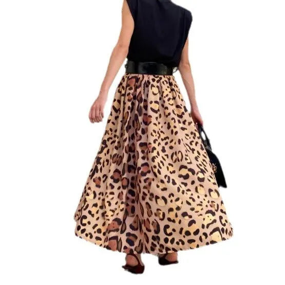 Brown leopard print women's A-line long skirt with a flared big hem, shown on a model.