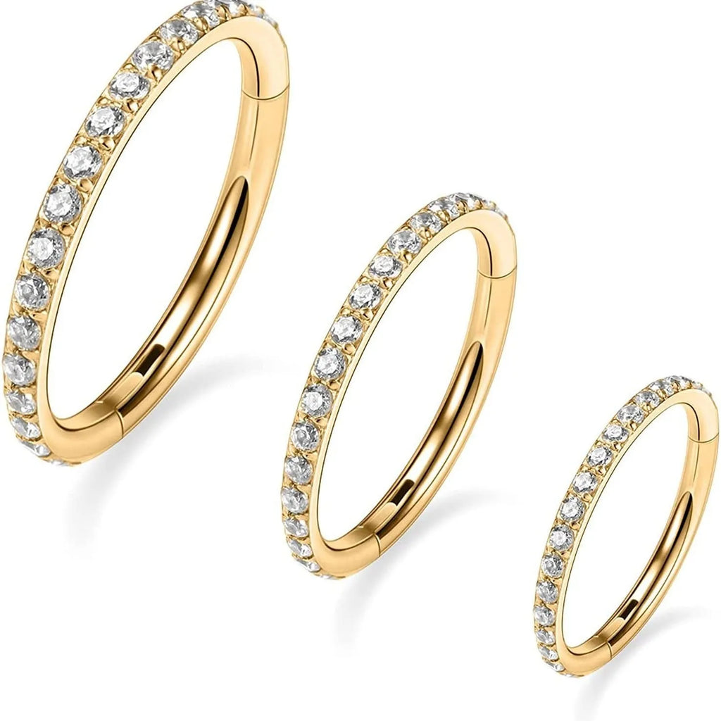 Stainless steel seamless nose ring showing colour options: black, gold, rose gold, and steel.