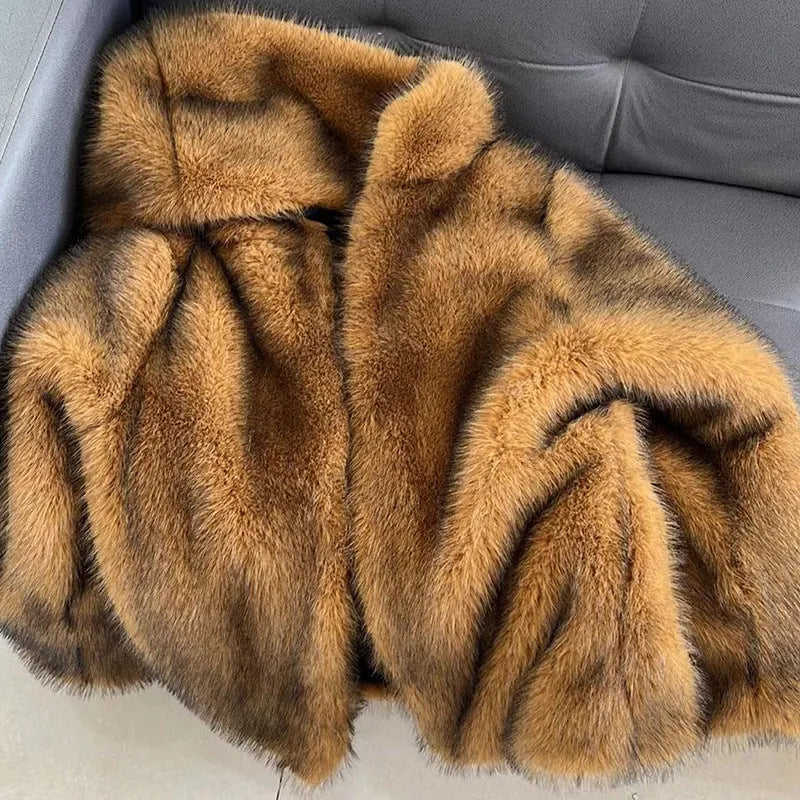 Women's loose silver grey artificial fur mid-length coat with an oversized fit.