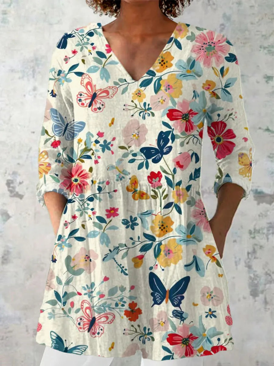 Women's retro-style slim fit long-sleeved top with a colourful digital print pattern.