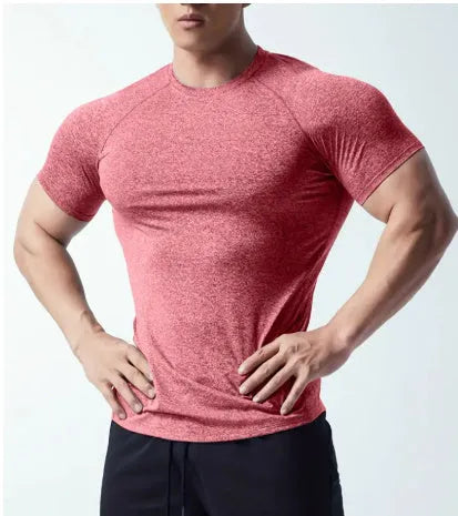 Man wearing a green quick-dry stretch polyester short sleeve t-shirt.
