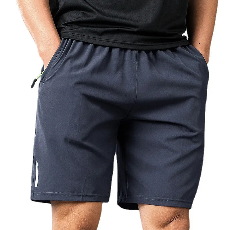 Men's polyester solid colour beach casual sports shorts with zippered pocket in black, gray, and blue
