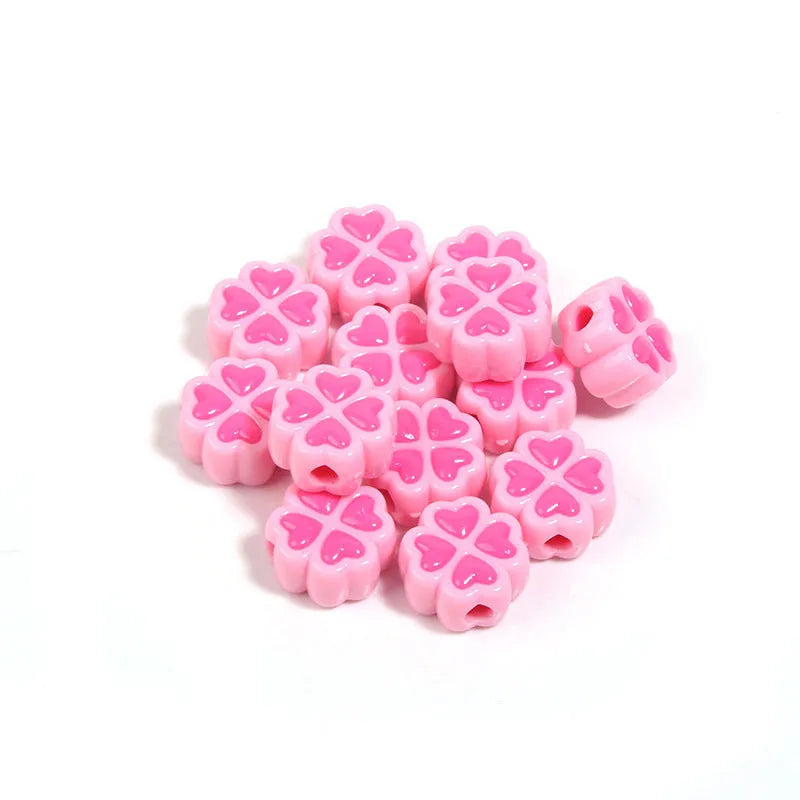 15mm acrylic clover craft beads with frosted finish in multiple colours including pink, blue, yellow, and green