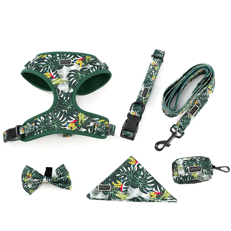Six-piece adjustable cloth dog harness set with collar, lead, waste bag, bow, and triangular scarf.