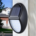 Black rectangular solar wall light with solar panel and LED illumination for outdoor use
