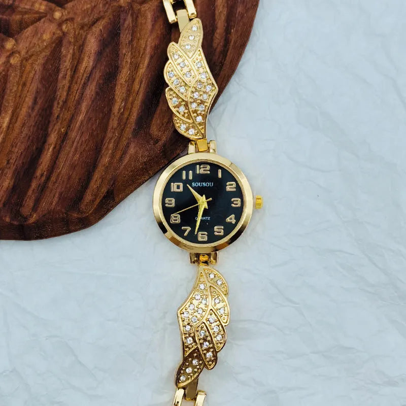 Women's stainless steel watch with round dial, available in gold, golden white, or golden black surface options