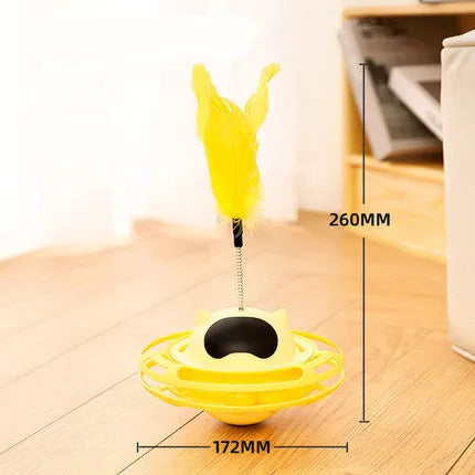 Pink cat tumbler turntable toy on a floor for feline self-play