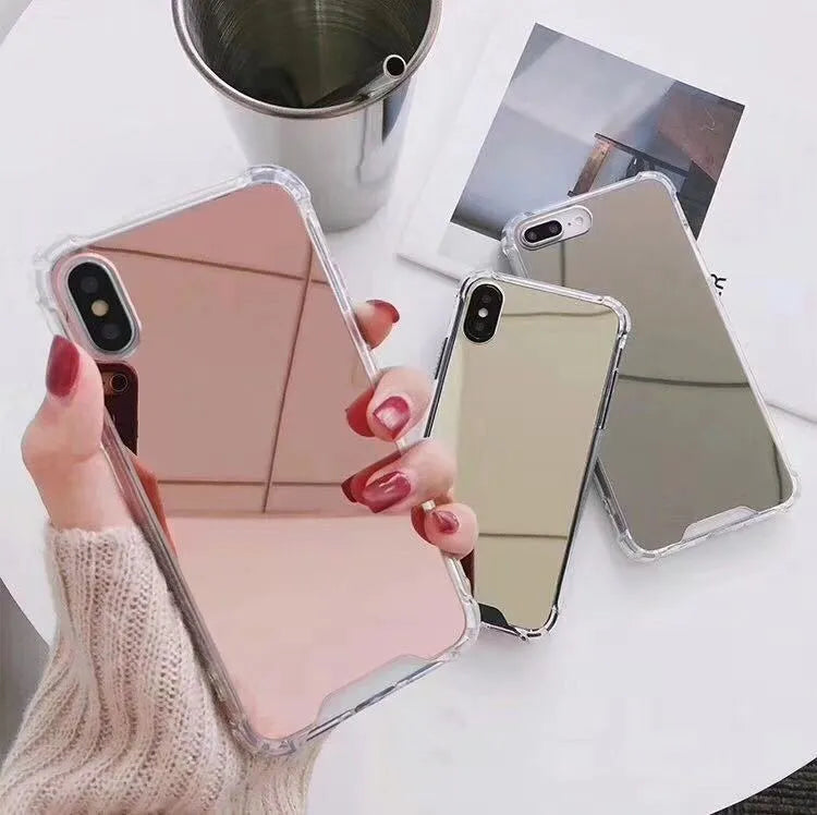 Black mirror-finish TPU protective case on an iPhone, showing soft edges and full screen coverage.