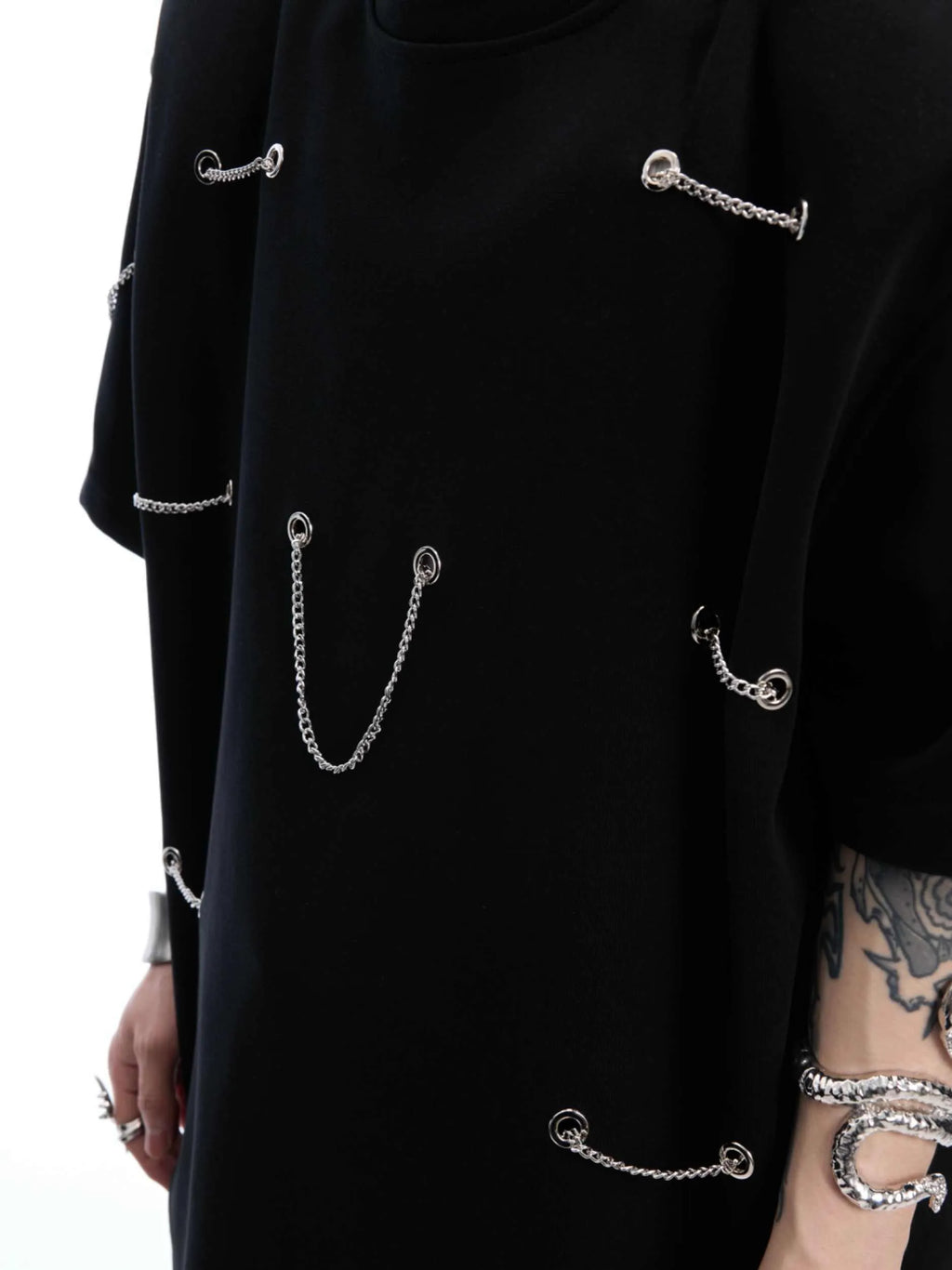 Black heavy cotton t-shirt with padded shoulder panels and silver metal chain decorative details