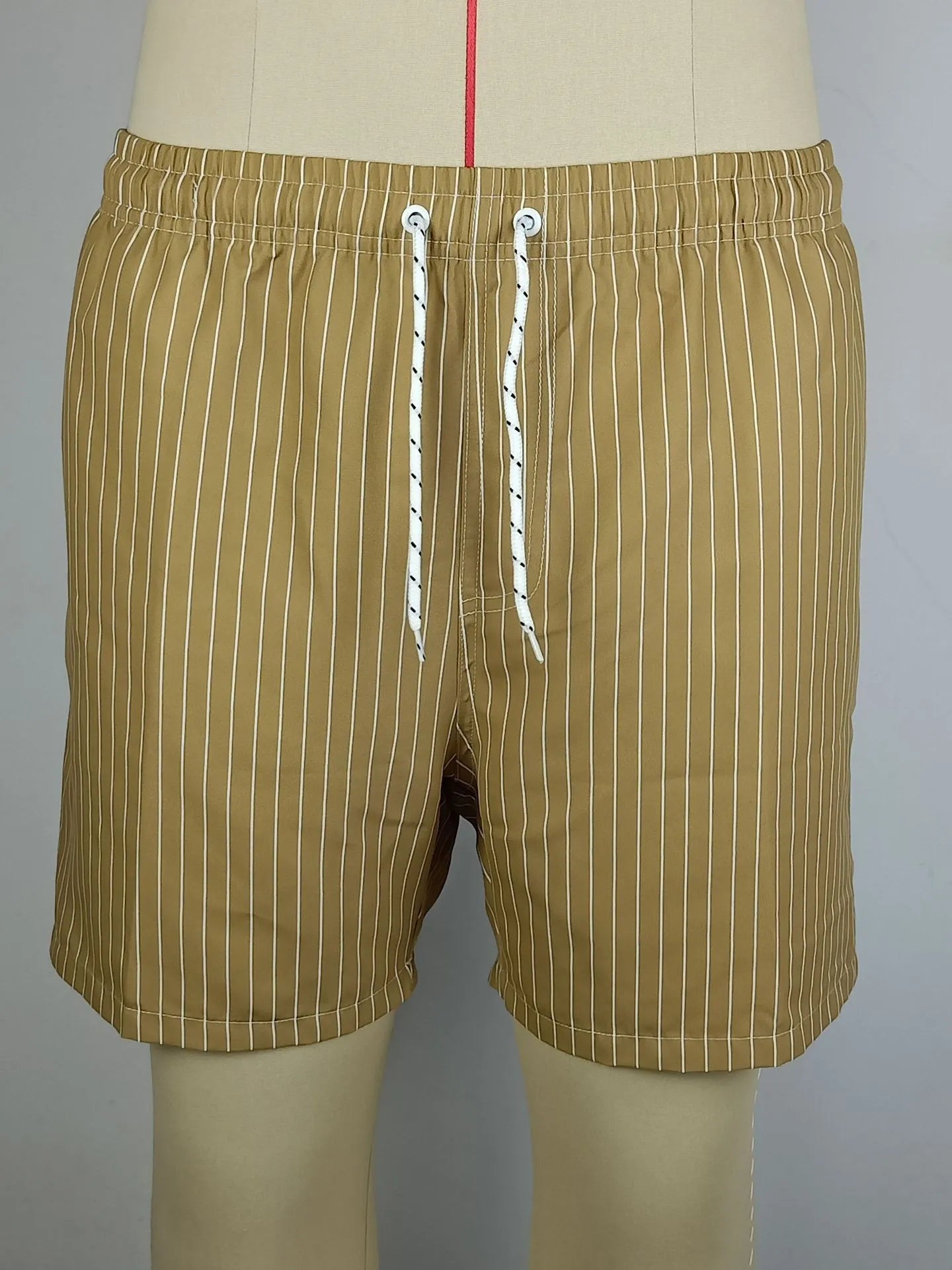 Striped polyester fibre beach shorts with triangle lining in navy blue, straight leg design