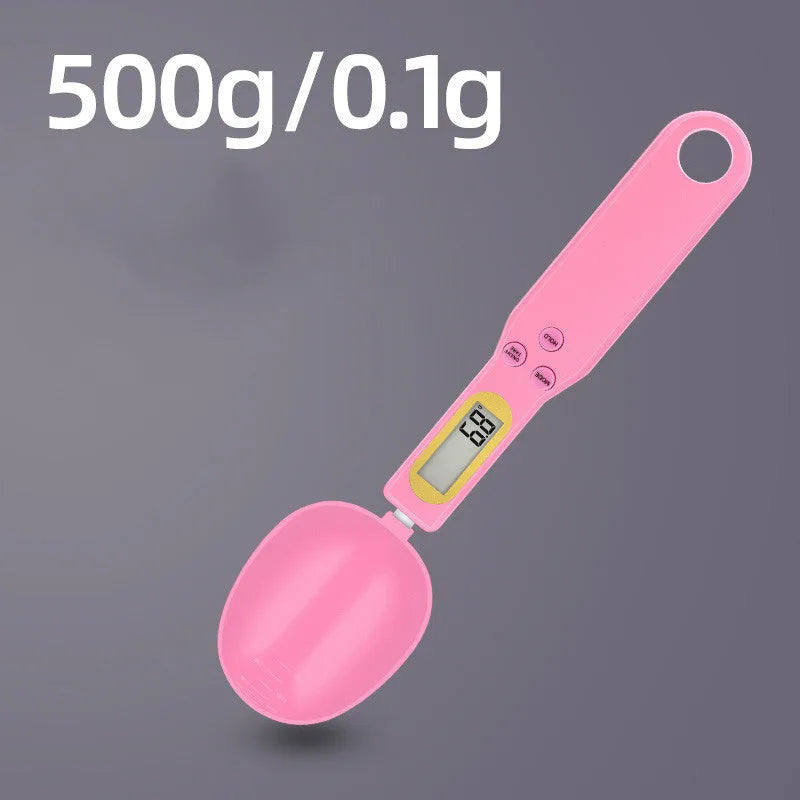 Black electronic digital scale with integrated measuring spoon showing weight display.