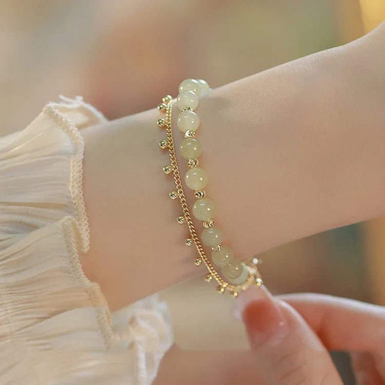Natural Hetian Jade bracelet with princess running motif for women's daily wear.